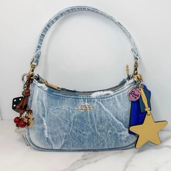 Coach Handbags - Coach loved denim Teri with charms